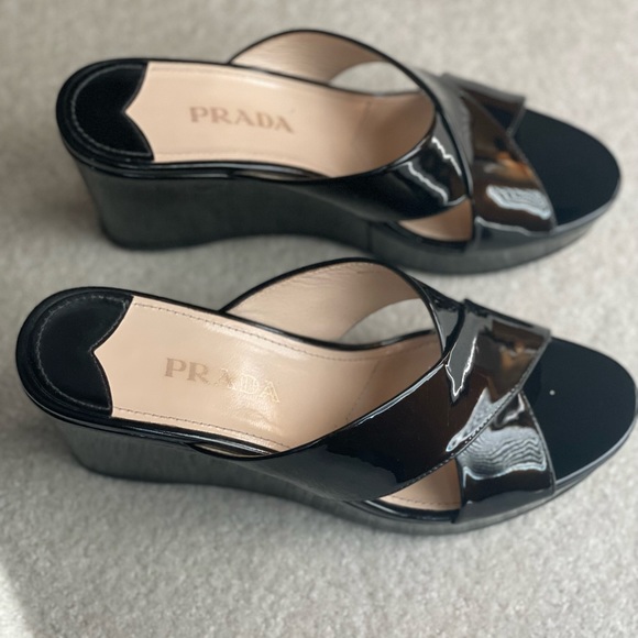 Prada Shoes - Authentic beautiful Prada black patent slide criss cross wedge sandals. Size 7.